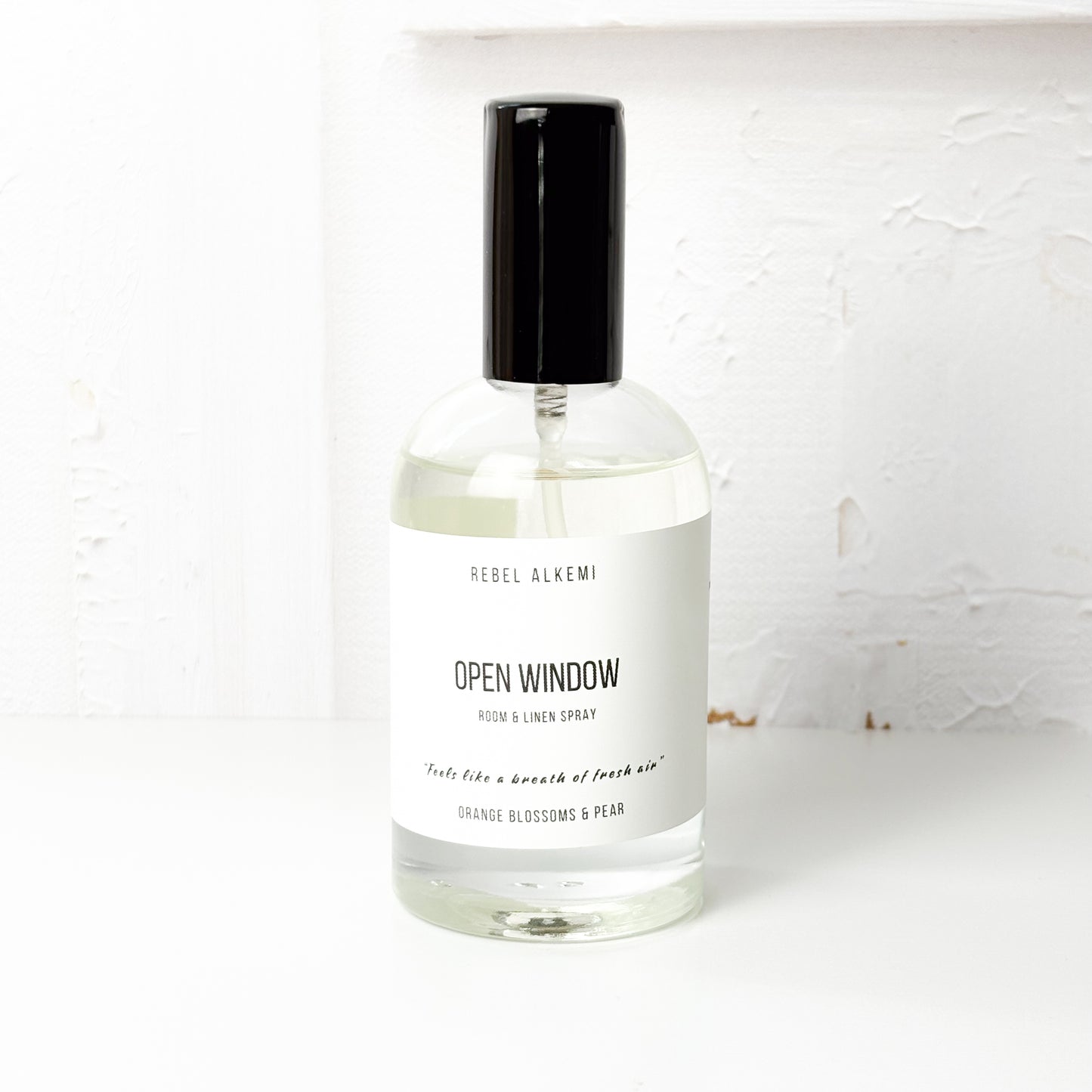 Rebel Alkemi Open Window room spray bottle on a white background