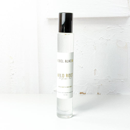 Wild root perfume oil smells like mint and oak musk on a white background 