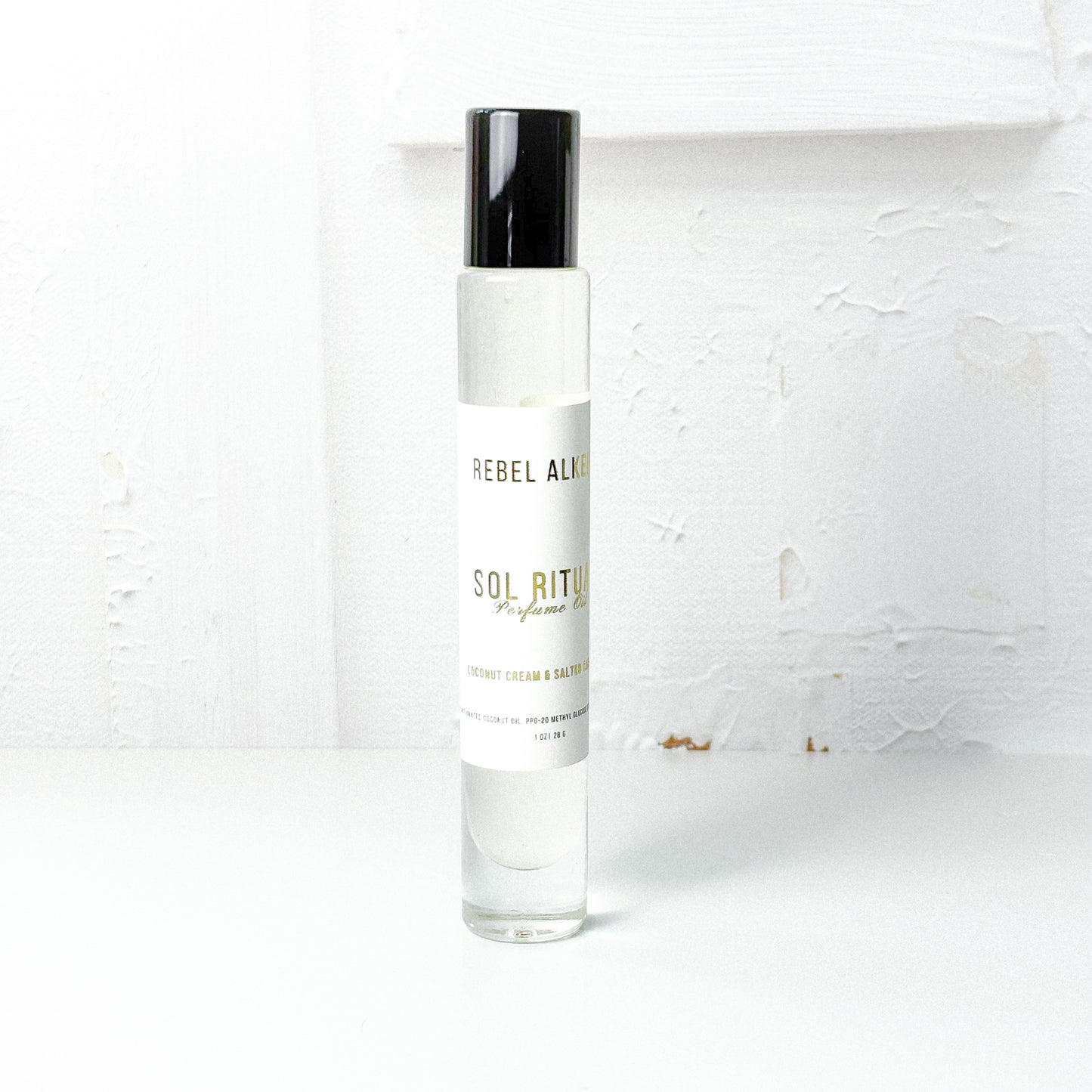 Sol ritual perfume oil on a white background
