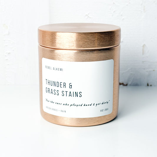 Thunder and grass stains smells like green grass and rain on a white background 