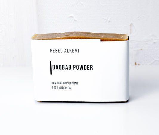 Rebel Alkemi Baobab Powder soap bar packaging on a white background