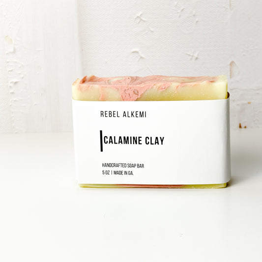Calamine Clay Handcrafted soap bar with 'Rebel Alkemi' branding on a white background